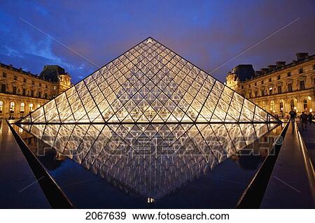 Louvre Pyramid By The Architect I. M. Pei At Night, Paris, France View Large Photo Image Stock Photo - Louvre Pyramid By The Architect I. M. Pei At Night, Paris, France. Fotosearch