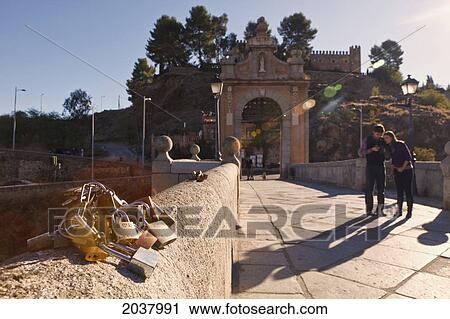 Stock Image - Love Locks On The Alcantara Bridge Over The Tagus River; Toledo Toledo Province Castilla-La Mancha Spain. Fotosearch