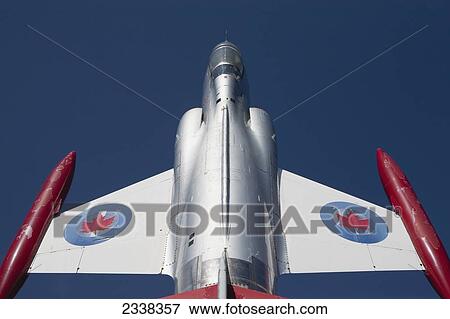 Stock Photo - Low Angle Close Up Of A Cf-104 Starfighter Plane With Deep Blue Sky; Mount Hope, Ontario, Canada. Fotosearch