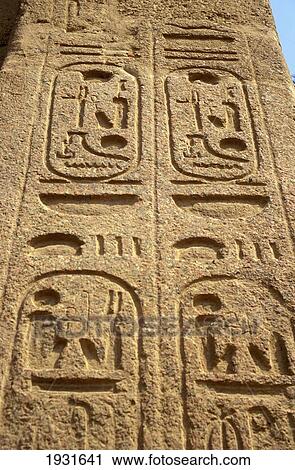 Stock Image - Low Angle Close-Up Of Cartouche And Hieroglyphics On Statue, Memphis, Egypt; Memphis, Egypt. Fotosearch