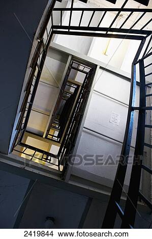 Picture - Low angle view of a stairway inside a building; Hamburg, Germany. Fotosearch