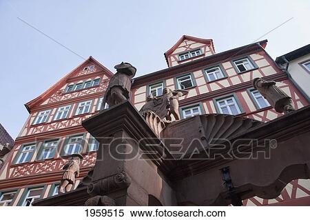 Low Angle View Of Angel's Well Sculpture In Wertheim Am Main, Baden-Wurttemberg, Germany View Large Photo Image Stock Photography - Low Angle View Of Angel's Well Sculpture In Wertheim Am Main, Baden-Wurttemberg, Germany. Fotosearch