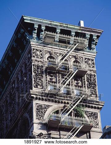 Stock Photo - Low Angle View Of Apartment Building. Fotosearch