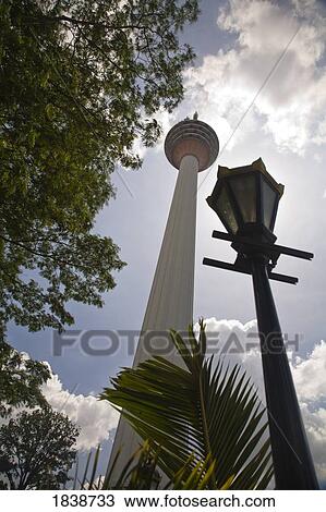 Stock Image - Low Angle View Of Communications Tower In Kuala Lumpur; Kuala Lumpur, Malaysia. Fotosearch