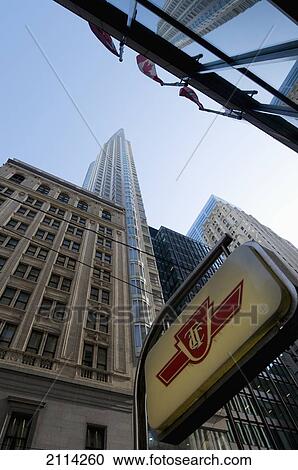Low Angle View Of Office Towers And A Toronto Transit Commission Sign; Toronto Ontario Canada View Large Photo Image Stock Image - Low Angle View Of Office Towers And A Toronto Transit Commission Sign; Toronto Ontario Canada. Fotosearch