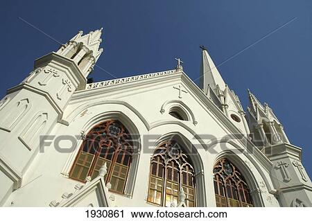 Stock Image - Low angle view of San Thome Cathedral, Chennai / Madras, Tamil Nadu, India, Chennai / Madras, Tamil Nadu, India.. Fotosearch