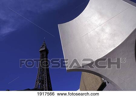 Stock Photograph - Low Angle View Of Sculpture And Blackpool Tower. Fotosearch