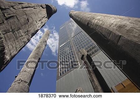 Low Angle View Of Sculptures And Skyscrapers View Large Photo Image Stock Image - Low Angle View Of Sculptures And Skyscrapers. Fotosearch