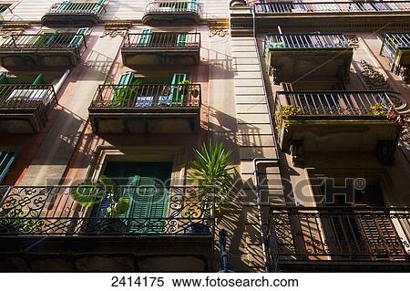Low angle view of shutter doors on balconies; Barcelona, Spain View Large Photo Image Stock Photography - Low angle view of shutter doors on balconies; Barcelona, Spain. Fotosearch