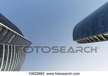 Stock Image - Low angle view of skyscrapers against a blue sky; Santiago, Santiago Metropolitan Region, Chile. Fotosearch