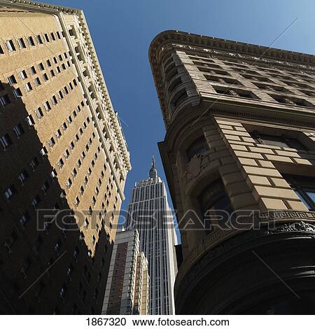 Low Angle View Of The Empire State Building, Manhattan, New York, Usa View Large Photo Image Stock Image - Low Angle View Of The Empire State Building, Manhattan, New York, Usa. Fotosearch