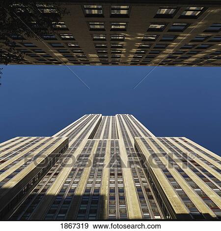Low Angle View Of The Empire State Building, Manhattan, New York, Usa View Large Photo Image Stock Photo - Low Angle View Of The Empire State Building, Manhattan, New York, Usa. Fotosearch