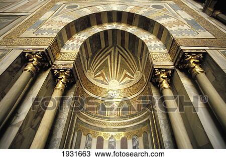 Stock Image - Low Angle View Of The Ornately Decorated Mihrab Of Sultan Hassan Madrassa, Cairo, Egypt; Cairo, Egypt. Fotosearch