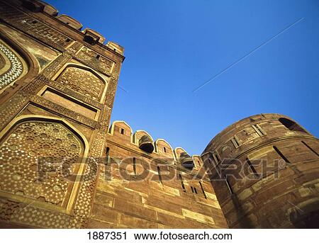 Stock Image - Low Angle View Of The Red Fort At Dusk.. Fotosearch