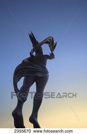 Stock Image - Low Angle View Of The Spirit Of South Shields Statue At Sunset; South Shields, Tyne And Wear, England. Fotosearch