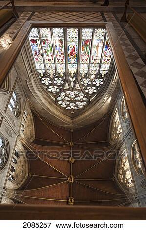 Stock Photo - Low Angle View Of The Wooden Dome Ceiling And Stained Glass Window In Ripon Cathedral; Ripon Yorkshire England. Fotosearch