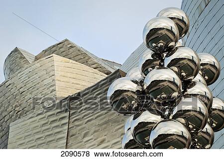 Stock Photo - Low Angle View Of Tree Tall Sculpture In Front Of Guggenheim Museum, Bilbao, Basque Country, Spain. Fotosearch