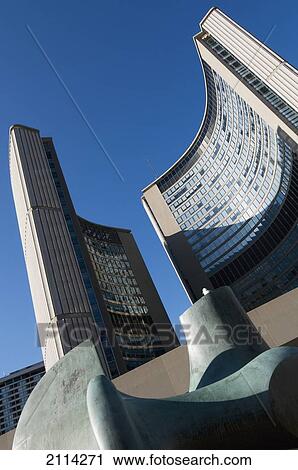 Low Angle View Of Two Curved Buildings Against A Blue Sky; Toronto Ontario Canada View Large Photo Image Stock Image - Low Angle View Of Two Curved Buildings Against A Blue Sky; Toronto Ontario Canada. Fotosearch