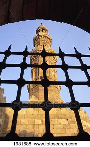 Stock Photo - Low Angle View Through A Gate Of Minarets Above Bab Zuwayla, Central Cairo, Cairo, Egypt; Central Cairo, Cairo, Egypt. Fotosearch