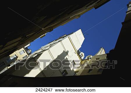 Low angle view up the side of residential buildings in the historical district of Marais; Paris, France View Large Photo Image Stock Photo - Low angle view up the side of residential buildings in the historical district of Marais; Paris, France. Fotosearch