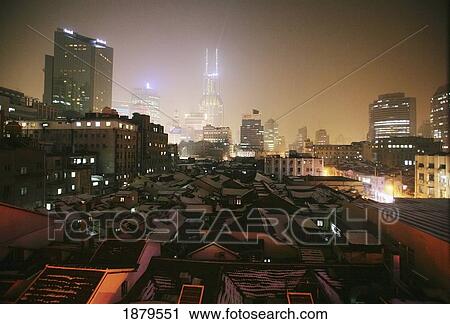 Low-Rise Flats With Skyscrapers In Background. View Large Photo Image Stock Image - Low-Rise Flats With Skyscrapers In Background.. Fotosearch