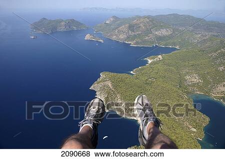 Low Section Of A Paraglider From Mt Babadag (1950 Meters) To Oludeniz At The Turquoise Coast, Southern Turkey View Large Photo Image Stock Photo - Low Section Of A Paraglider From Mt Babadag (1950 Meters) To Oludeniz At The Turquoise Coast, Southern Turkey. Fotosearch