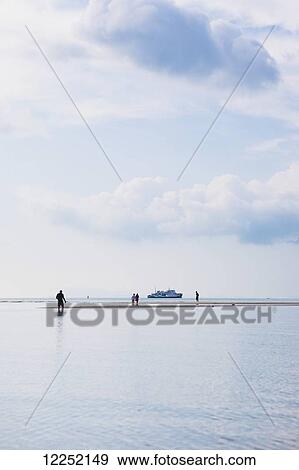 Stock Photo - Low tide at Nathon Beach on Ko Samui; Nathon, Ko Samui, Thailand. Fotosearch
