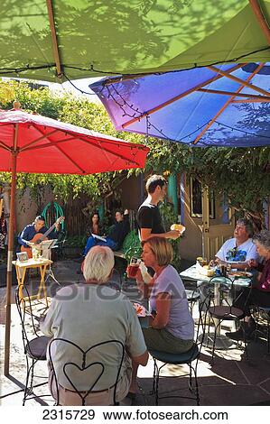 Lunch crowd at Shed restaurant in downtown; Santa Fe, New Mexico, USA View Large Photo Image Stock Photo - Lunch crowd at Shed restaurant in downtown; Santa Fe, New Mexico, USA. Fotosearch