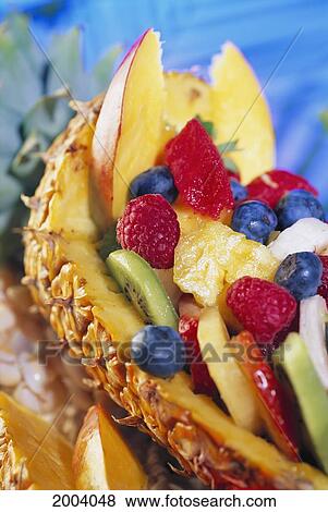 Luscious Fresh Fruit Salad Served In Tropical Pineapple Assortment View Large Photo Image Stock Photo - Luscious Fresh Fruit Salad Served In Tropical Pineapple Assortment. Fotosearch