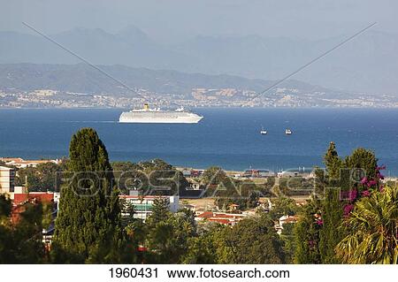 Stock Image - Luxury Passenger Liner In Malaga Bay; Torremolinos, Malaga Province, Costa Del Sol, Spain. Fotosearch