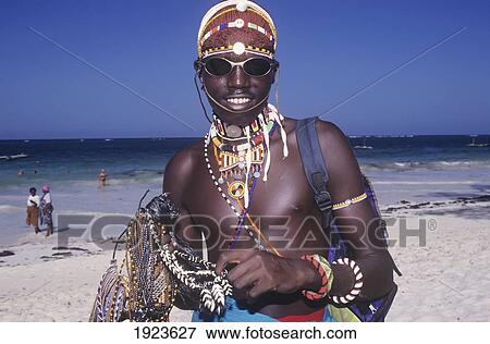 Maasai/ Mara Tribesman Selling Beads On The Beach, Diani Beach View Large Photo Image Stock Photo - Maasai/ Mara Tribesman Selling Beads On The Beach, Diani Beach. Fotosearch