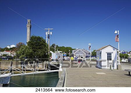 MacMillan Wharf and Pilgrim Monument; Provincetown, Cape Cod, Massachusetts, United States of America View Large Photo Image Picture - MacMillan Wharf and Pilgrim Monument; Provincetown, Cape Cod, Massachusetts, United States of America. Fotosearch
