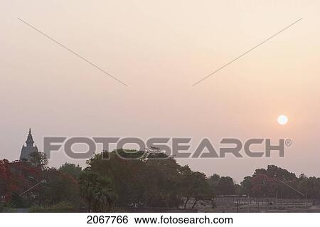 Stock Photograph - Mahabodi Temple At Sunrise, Bodhgaya, Bihar, India. Fotosearch