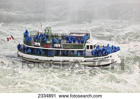 Maid Of The Mist Tour Boat Carrying Tourists Below Horseshoe Falls; Niagara Falls Ontario Canada View Large Photo Image Stock Image - Maid Of The Mist Tour Boat Carrying Tourists Below Horseshoe Falls; Niagara Falls Ontario Canada. Fotosearch