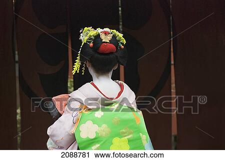 Maiko (Geisha Apprentice) Entering The Tea House; Kyoto, Japan View Large Photo Image Stock Image - Maiko (Geisha Apprentice) Entering The Tea House; Kyoto, Japan. Fotosearch