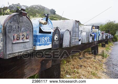 Mailboxes in a row; California, United States of America View Large Photo Image Stock Photo - Mailboxes in a row; California, United States of America. Fotosearch
