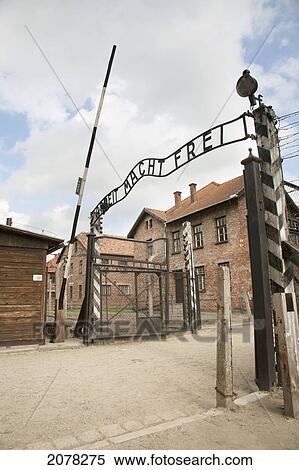 Main Gate With The 'arbeit Macht Frei' Slogan Over It, Auschwitz Concentration Camp, Oswiecim, Malopolska, Poland View Large Photo Image Stock Photography - Main Gate With The 'arbeit Macht Frei' Slogan Over It, Auschwitz Concentration Camp, Oswiecim, Malopolska, Poland. Fotosearch