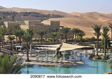 Stock Photo - Main Pool And Dunes, Qasr Al Sarab, Abu Dhabi. Fotosearch