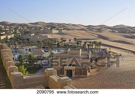Stock Photography - Main Pool And Dunes, Qasr Al Sarab, Abu Dhabi. Fotosearch