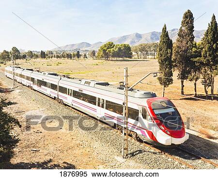 Malaga, Andalusia, Spain; Renfe Suburban Train Near Torremolinos In Costa Del Sol View Large Photo Image Stock Photography - Malaga, Andalusia, Spain; Renfe Suburban Train Near Torremolinos In Costa Del Sol. Fotosearch