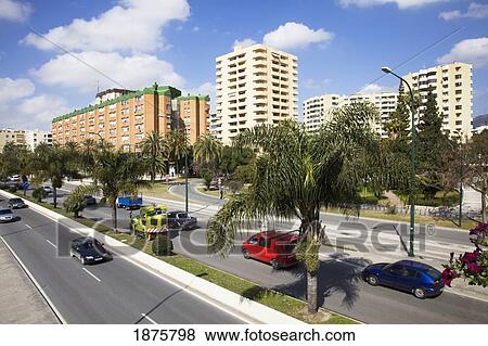 Stock Photo - Malaga, Andalusia, Spain; Vehicles Traveling On The Streets. Fotosearch