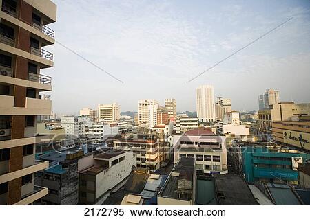 Malaysia, Chinatown; Kuala Lumpur, View over rooftops and city centre from hotel View Large Photo Image Stock Photography - Malaysia, Chinatown; Kuala Lumpur, View over rooftops and city centre from hotel. Fotosearch