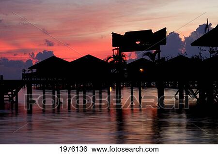 Malaysia, Mabul Island, Sunset Over Sipidan Water Village. View Large Photo Image Stock Photograph - Malaysia, Mabul Island, Sunset Over Sipidan Water Village.. Fotosearch