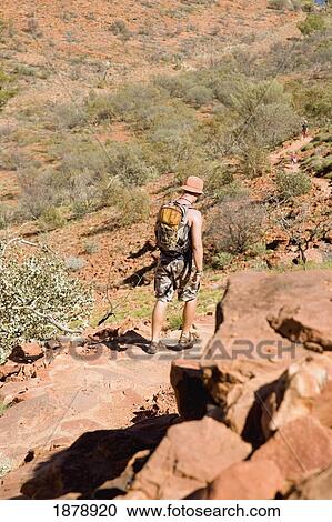 Male Backpacker Descending Rocks In Kings Canyon View Large Photo Image Stock Image - Male Backpacker Descending Rocks In Kings Canyon. Fotosearch