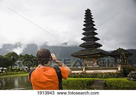 Male Tourist Photographing Temple View Large Photo Image Stock Image - Male Tourist Photographing Temple. Fotosearch