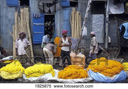 Male Workers And Yellow And Orange Flower Garlands View Large Photo Image Stock Photography - Male Workers And Yellow And Orange Flower Garlands. Fotosearch