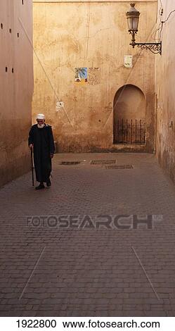 Stock Image - Man At Ali Ben Youssef Mendersa. Fotosearch