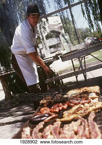 Man At Barbecue View Large Photo Image Stock Image - Man At Barbecue. Fotosearch