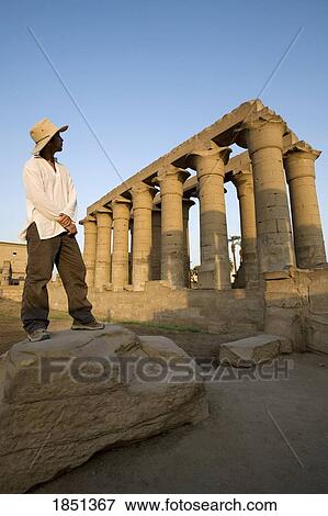Stock Photo - Man At Luxor Temple. Fotosearch