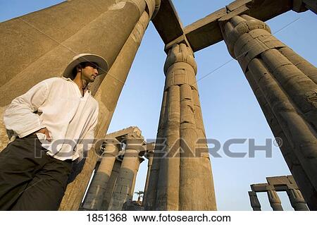 Man At Luxor Temple View Large Photo Image Stock Photo - Man At Luxor Temple. Fotosearch